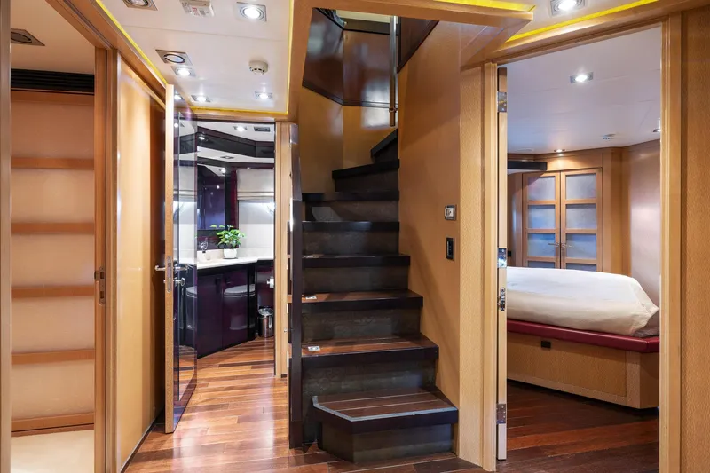 Slide: The Image of Luxurious interior of 2008 Palmer Johnson 120 Sports Cruiser with modern staircase and elegant wood finishes. - 45