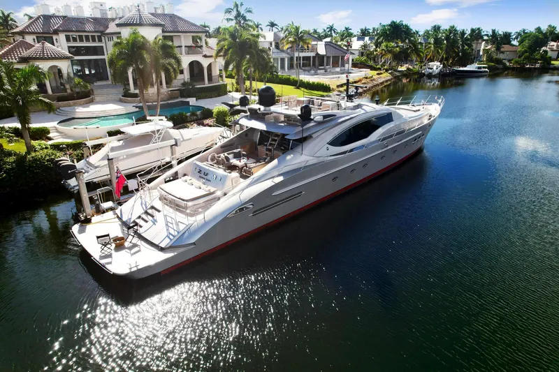 Slide: The Image of Palmer Johnson 120 Sports Cruiser 2008 docked near luxury waterfront homes. - 6