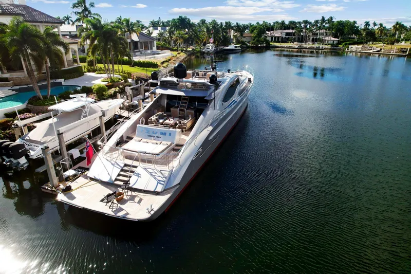 Slide: The Image of 2008 Palmer Johnson 120 Sports Cruiser docked in a luxurious waterfront setting. - 7