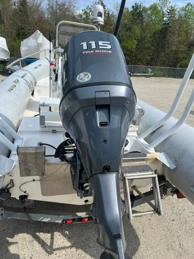 Slide: The Image of 2004 AB 570 VST boat with 115 horsepower outboard motor. - 3