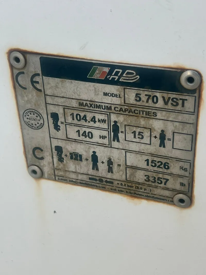 Slide: The Image of 2004 AB 570 VST boat capacity plate with specifications and maximum capacities. - 8