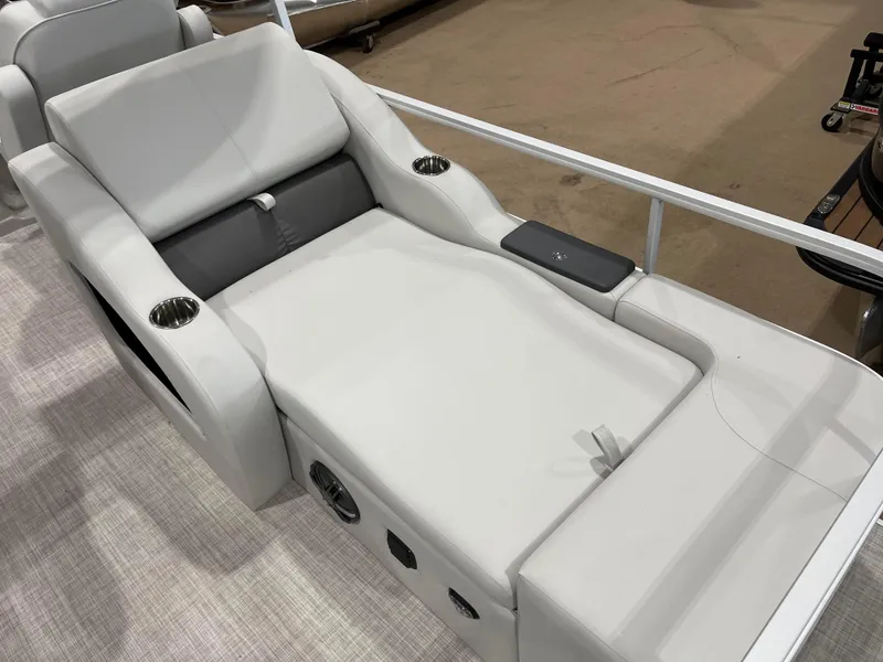 Slide: The Image of 2024 SunCatcher Fusion 324SS boat lounge seat with cup holders and armrest. - 21