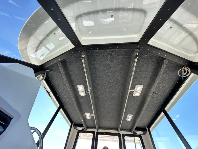 Slide: The Image of Interior roof view of a 1992 Custom Hueneme Boat Works vessel with lighting fixtures. - 24