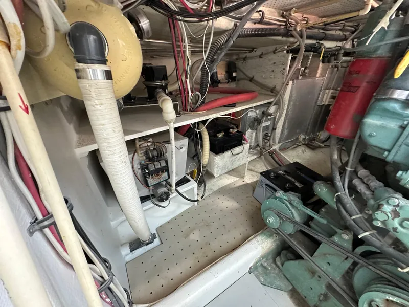 Slide: The Image of Engine room of a 1992 Custom Hueneme Boat Works vessel with various mechanical components. - 38