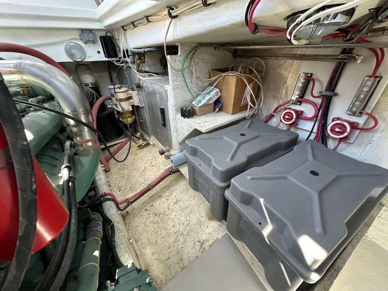 Slide: The Image of Engine room of a 1992 Custom Hueneme Boat Works vessel with wiring and battery boxes. - 39