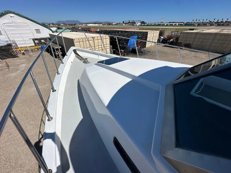 Slide: The Image of Custom 1992 Hueneme Boat Works vessel on dry dock, showing deck and railing. - 6