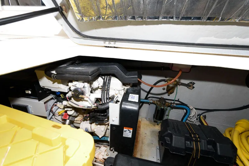 Slide: The Image of Engine compartment of 2003 Meridian 381 Sedan with visible components and wiring. - 22