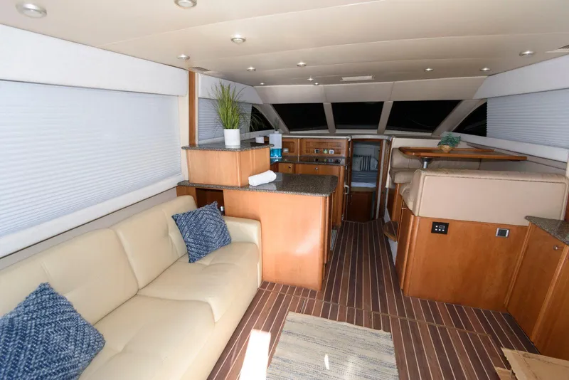 Slide: The Image of Luxurious interior of 2003 Meridian 381 Sedan yacht with modern furnishings. - 9