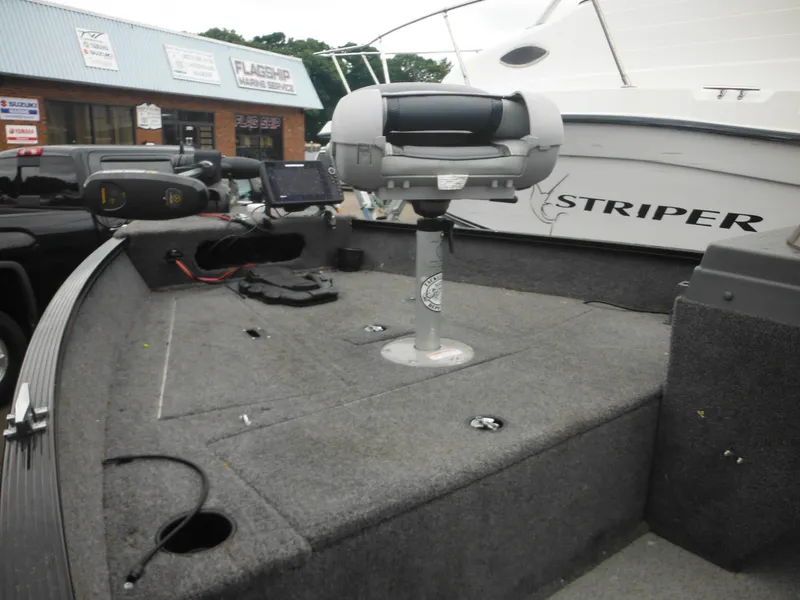 Slide: The Image of 2018 Lund 1625 Fury XL SS boat interior with fishing equipment. - 14
