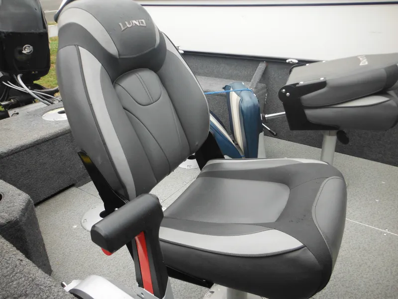 Slide: The Image of 2018 Lund 1625 Fury XL SS boat seat, gray and black upholstery. - 18