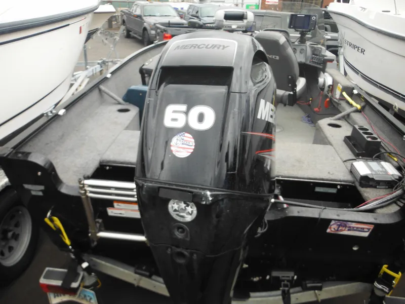 Slide: The Image of 2018 Lund 1625 Fury XL SS boat with Mercury 60 HP outboard motor. - 35