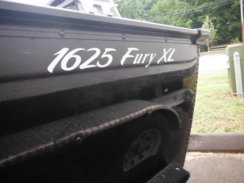 Slide: The Image of 2018 Lund 1625 Fury XL SS boat side view. - 39