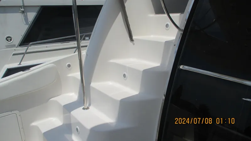 Slide: The Image of Staircase on a 2007 Regal 4080 Sportyacht. - 11