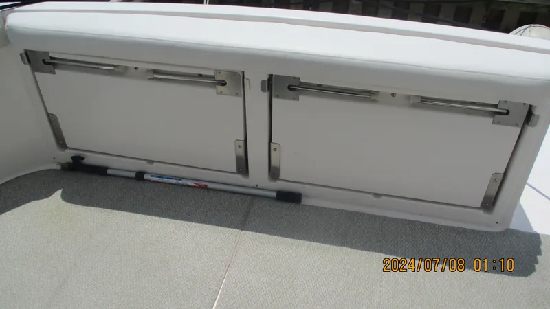Slide: The Image of Storage compartments on a 2007 Regal 4080 Sportyacht. - 13