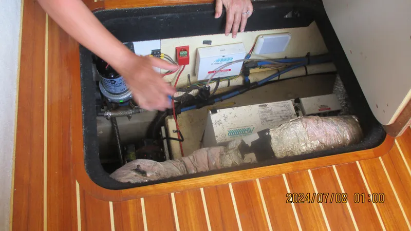 Slide: The Image of Inspection of the engine compartment on a 2007 Regal 4080 Sportyacht. - 15