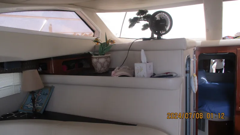 Slide: The Image of Interior of 2007 Regal 4080 Sportyacht with decor and window view. - 19