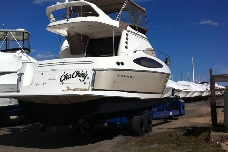 Slide: The Image of 2007 Regal 4080 Sportyacht on trailer in marina. - 3