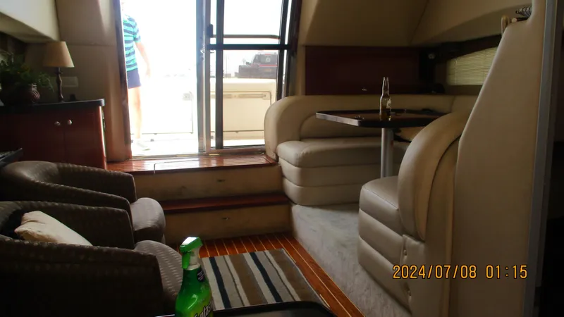 Slide: The Image of Interior of 2007 Regal 4080 Sportyacht with seating area and table. - 33