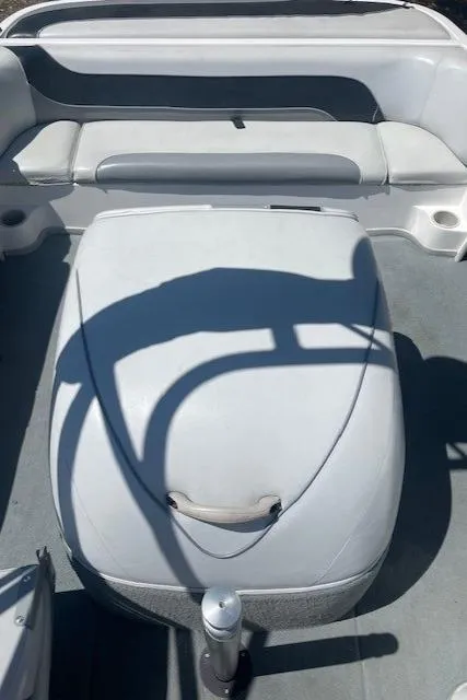 Slide: The Image of 2001 Moomba Mobius SK boat interior with seating and engine cover. - 7