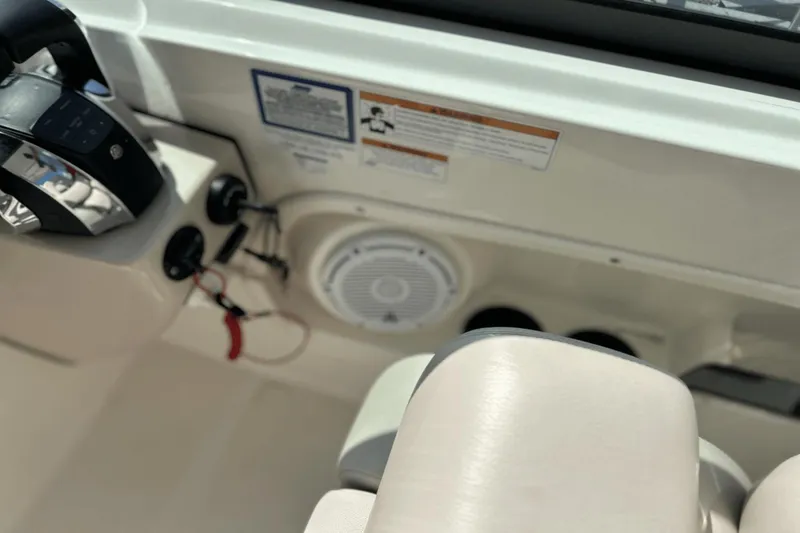 Slide: The Image of Interior of 2017 Boston Whaler 270 Vantage boat showing controls and speaker. - 21