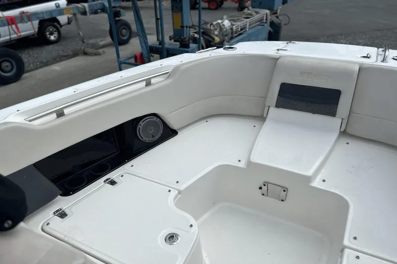 Slide: The Image of 2017 Boston Whaler 270 Vantage boat interior with seating and storage compartments. - 32