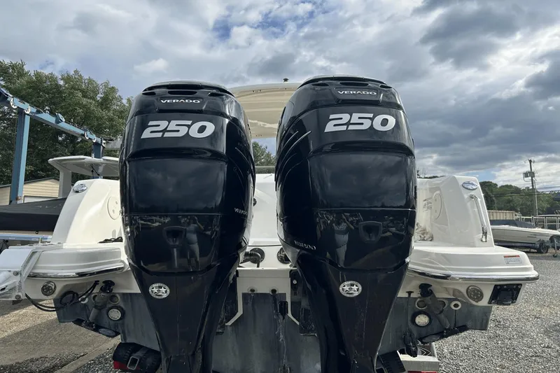 Slide: The Image of 2017 Boston Whaler 270 Vantage with twin 250 Verado engines, outdoor setting. - 6