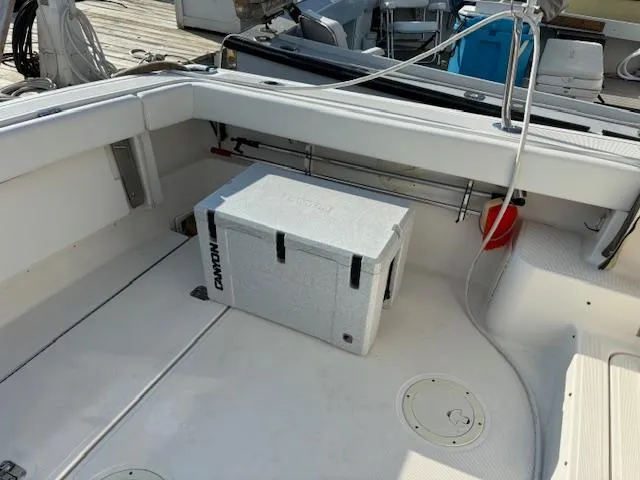 Slide: The Image of 2001 Tiara Yachts 2900 Open cockpit with white seating and helm station. - 12