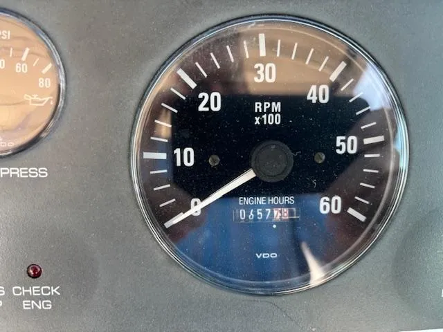 Slide: The Image of 2001 Tiara Yachts 2900 Open at dock, showing spacious deck and seating area. - 17