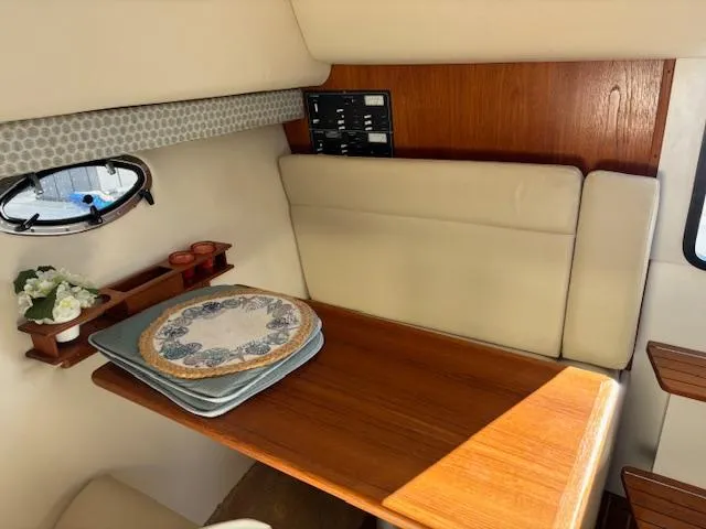 Slide: The Image of 2001 Tiara Yachts 2900 Open galley with microwave, stove, and mini-fridge. - 22