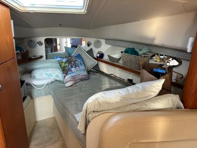 Slide: The Image of Compact kitchen area in a 2001 Tiara Yachts 2900 Open boat with sink and stove. - 23