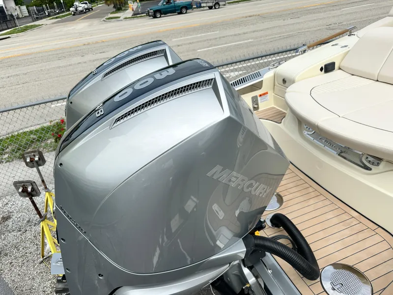 Slide: The Image of 2025 Chris-Craft Launch 31 GT with dual Mercury outboard engines. - 5
