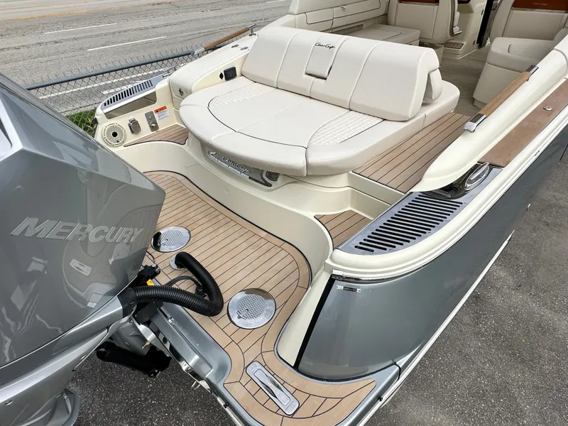 Slide: The Image of 2025 Chris-Craft Launch 31 GT boat with Mercury engine and luxurious seating. - 6