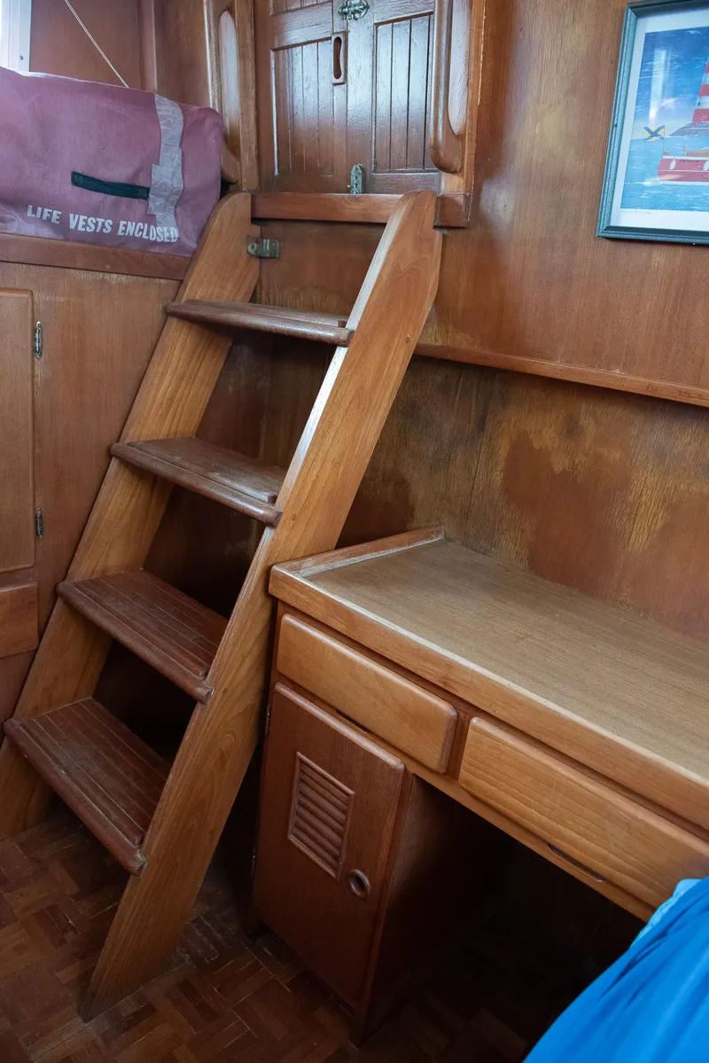 Slide: The Image of 1978 CHB Puget Trawler 37 interior with wooden ladder and desk. - 32