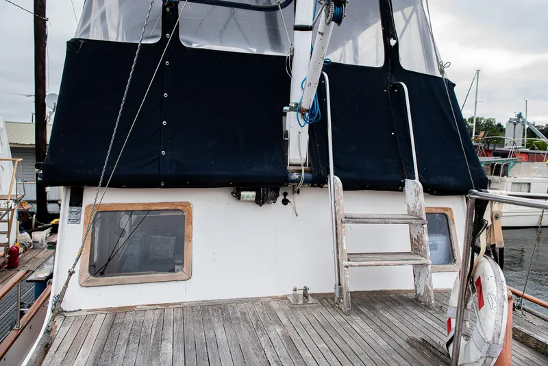 Slide: The Image of 1978 CHB Puget Trawler 37 rear deck with wooden ladder and windows. - 53