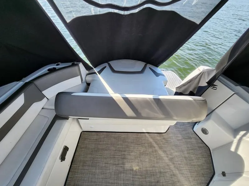 Slide: The Image of 2019 Monterey 335SY boat interior with seating and water view. - 10