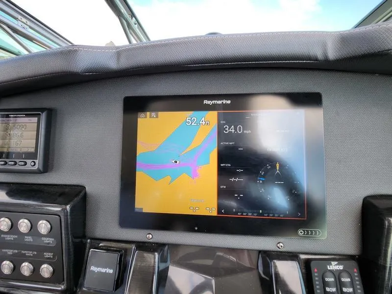 Slide: The Image of Monterey 335SY 2019 dashboard with Raymarine navigation display. - 16