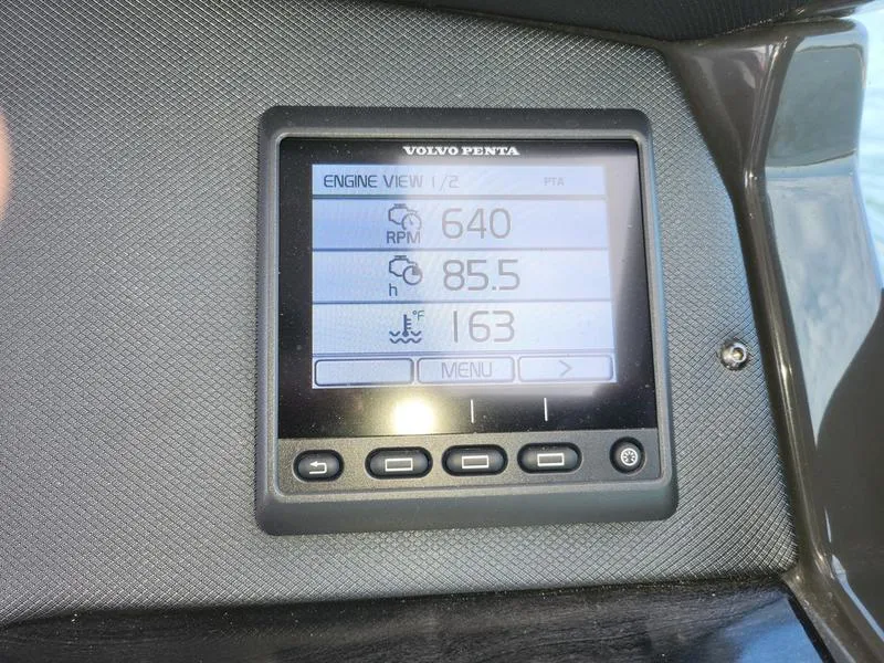 Slide: The Image of Volvo Penta engine display on 2019 Monterey 335SY boat dashboard. - 18