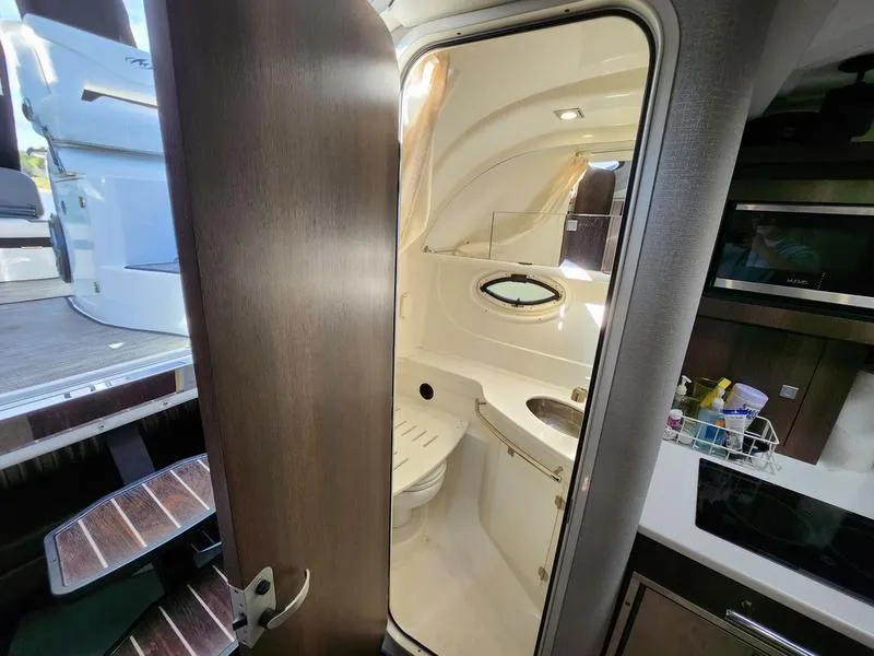 Slide: The Image of 2019 Monterey 335SY yacht bathroom interior with modern amenities and sleek design. - 26