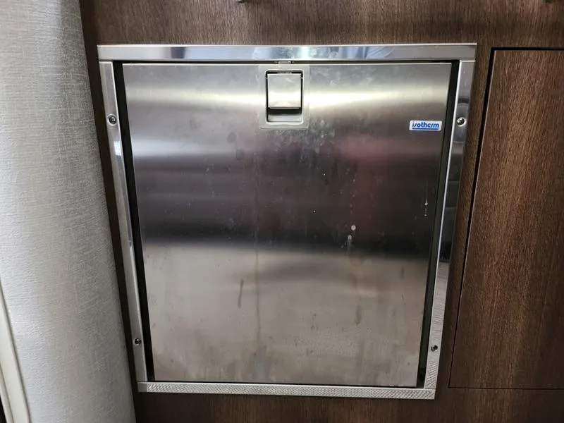 Slide: The Image of Stainless steel hatch on 2019 Monterey 335SY boat interior. - 29