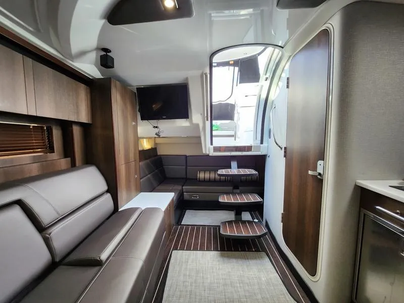 Slide: The Image of Interior of 2019 Monterey 335SY yacht with modern seating and sleek design. - 31
