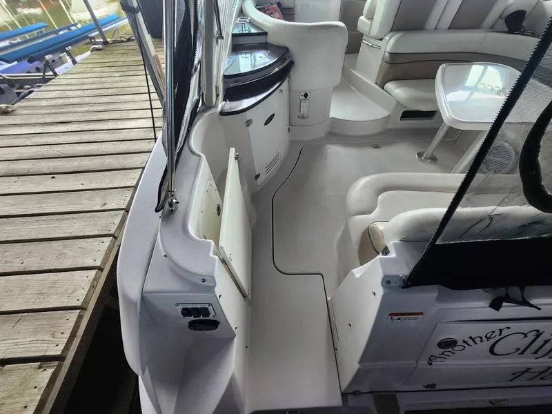 Slide: The Image of 2007 Four Winns 358 Vista boat interior with seating and dock view. - 10