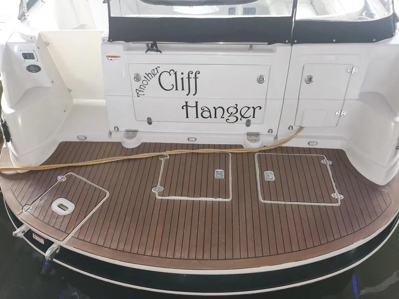 Slide: The Image of 2007 Four Winns 358 Vista boat stern with Cliff Hanger name. - 11