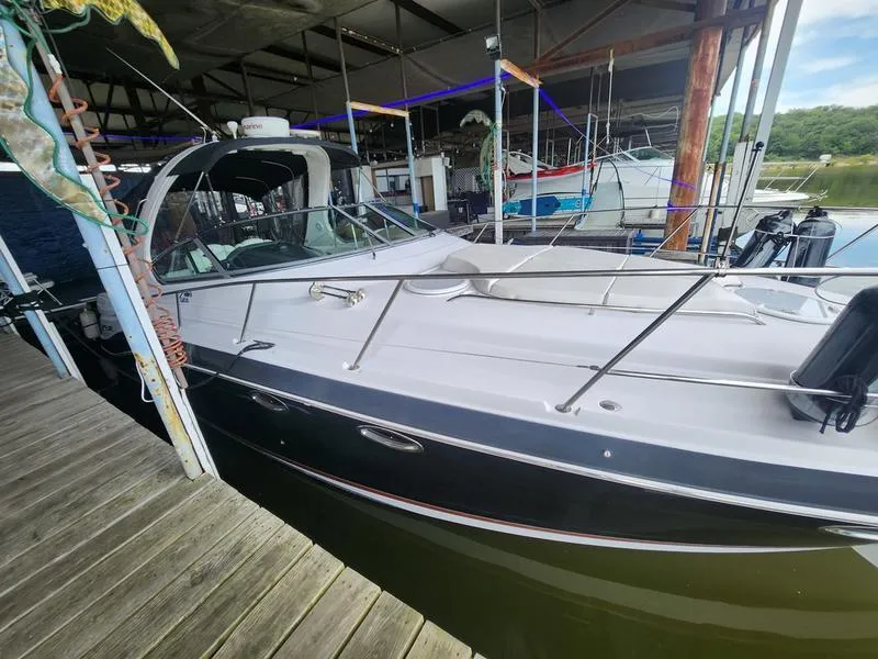 Slide: The Image of 2007 Four Winns 358 Vista boat docked in a marina. - 2