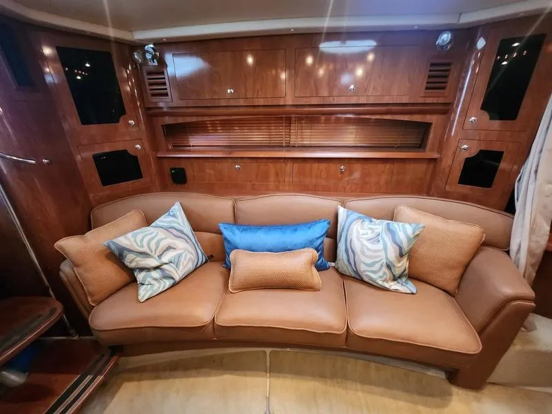 Slide: The Image of Luxurious interior of 2007 Four Winns 358 Vista with leather sofa and decorative pillows. - 20