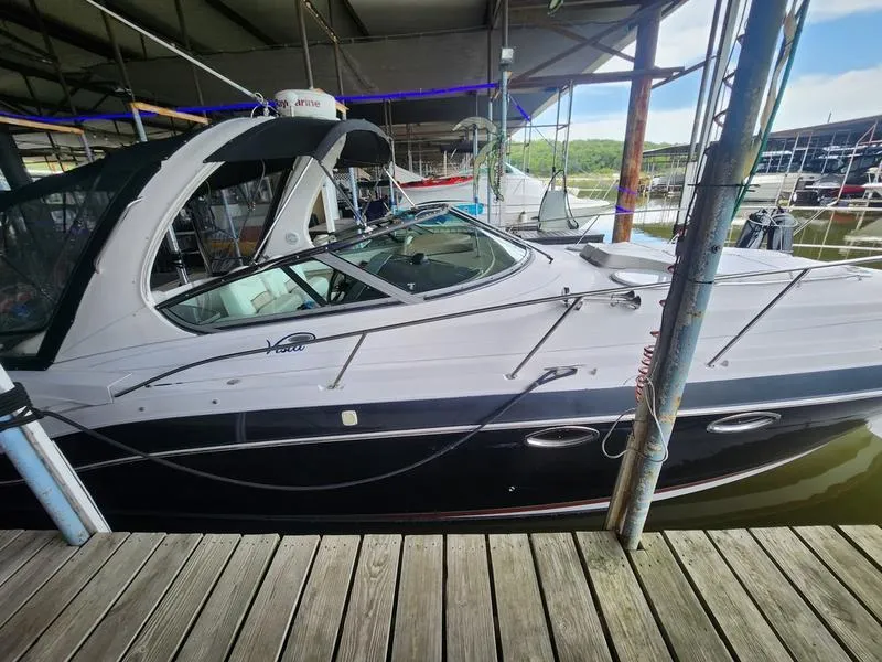 Slide: The Image of 2007 Four Winns 358 Vista boat docked in a marina. - 3