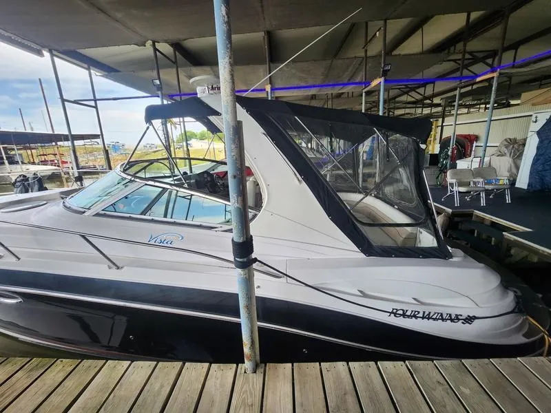 Slide: The Image of 2007 Four Winns 358 Vista boat docked in a marina. - 6