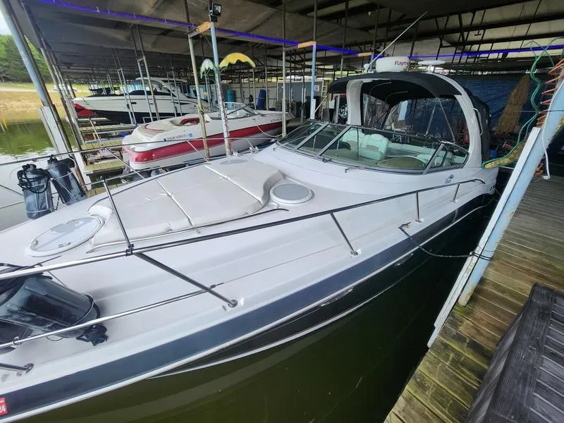 Slide: The Image of 2007 Four Winns 358 Vista boat docked in a marina. - 8