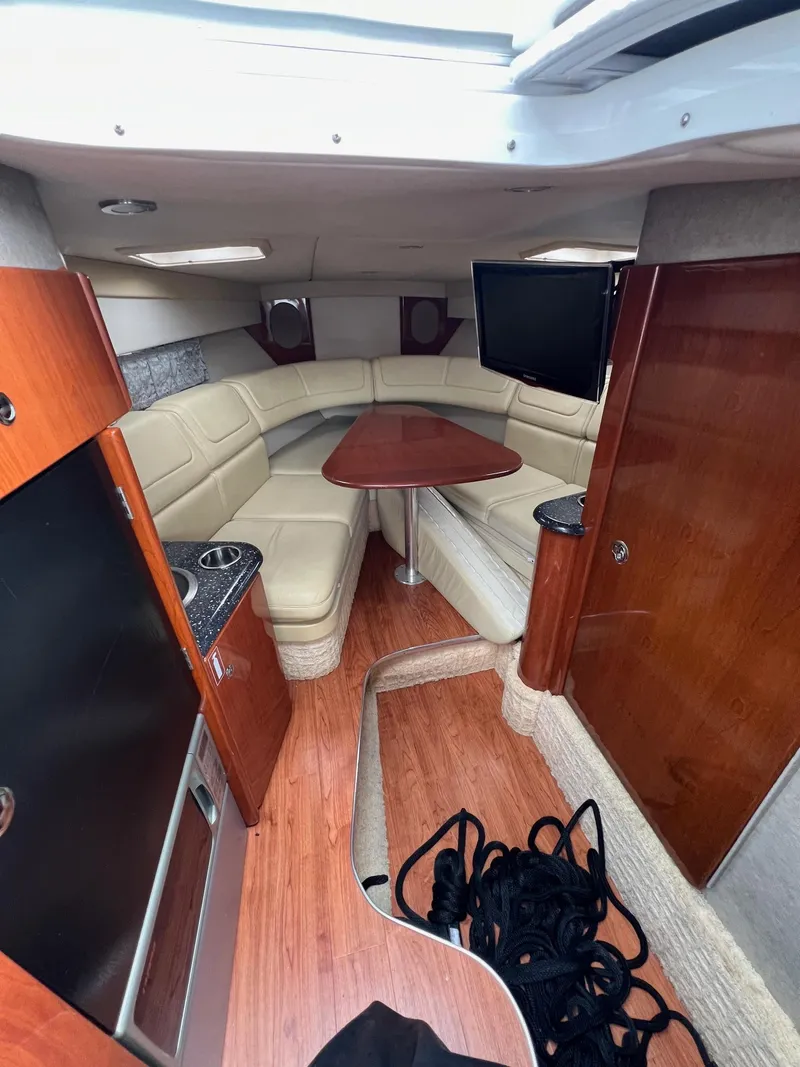 Slide: The Image of Interior of 2007 Formula 310SS boat with leather seating and wooden finishes. - 6