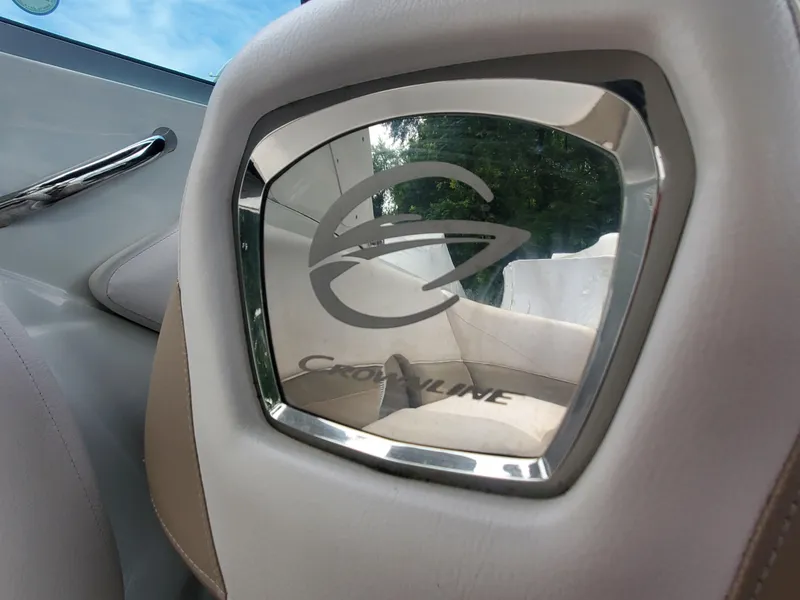 Slide: The Image of Crownline 285 SS 2014 boat interior with logo on seat headrest. - 15