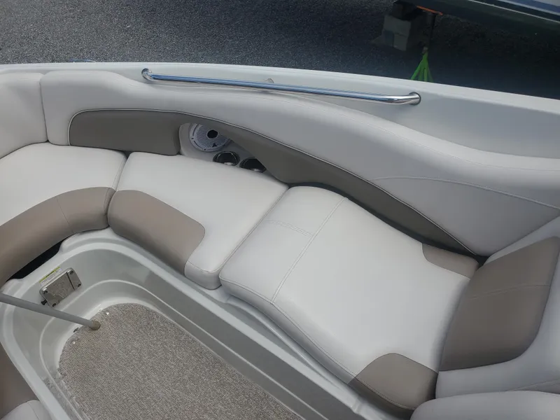 Slide: The Image of 2014 Crownline 285 SS boat interior with cushioned seating. - 16